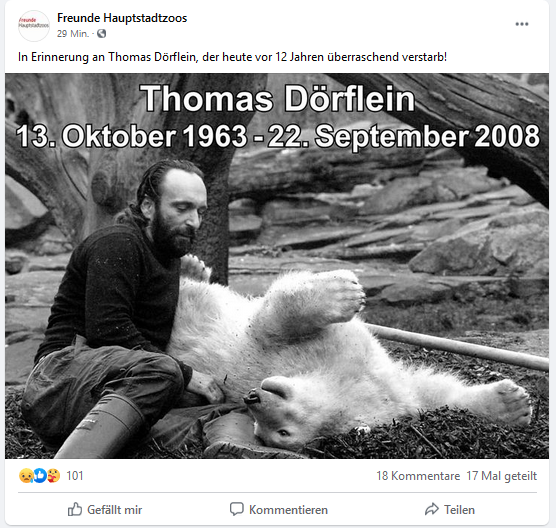 Screenshot of a Facebook post. Text: In memory of Thomas Dörflein, who died twelve years ago today! Image: A black and white photo of a bearded man in gumboots cuddling Knut, who is lying on his back. Image caption: 13 October 1963 - 22 September 2008. 101 reactions, 18 comments, 17 shares.