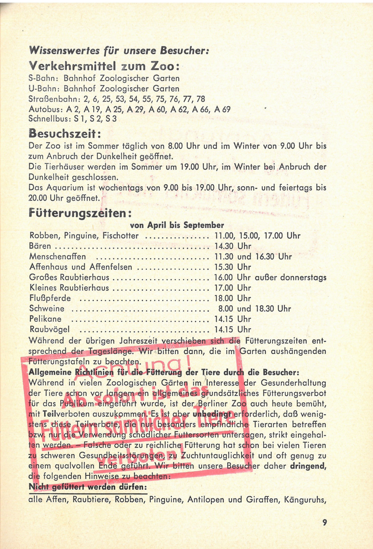 Page 9 of an outdated zoo guide. Headings: Getting to the Zoo; Visiting Hours; Feeding Times. Large red stamp in the lower third of the brochure, right across the "Allgemeine Richtlinien für die Fütterung der Tiere durch die Besucher": Attention! From now on, feeding all animals is prohibited!