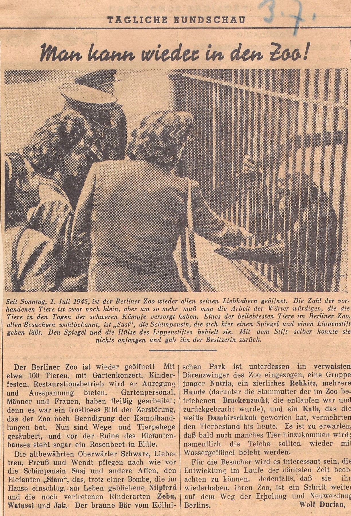 Newspaper clipping. Title: We can go to the zoo again! Illustration: Five people in front of an enclosure, one placing something in a monkey's outstretched hand.